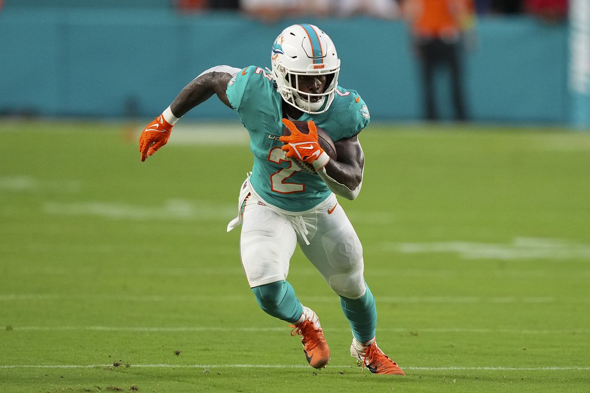 Chase Edmonds #2 of the Miami Dolphins runs upfield during the second quarter against the Las Vegas Raiders at Hard Rock Stadium on August 20, 2022 in Miami Gardens, Florida.