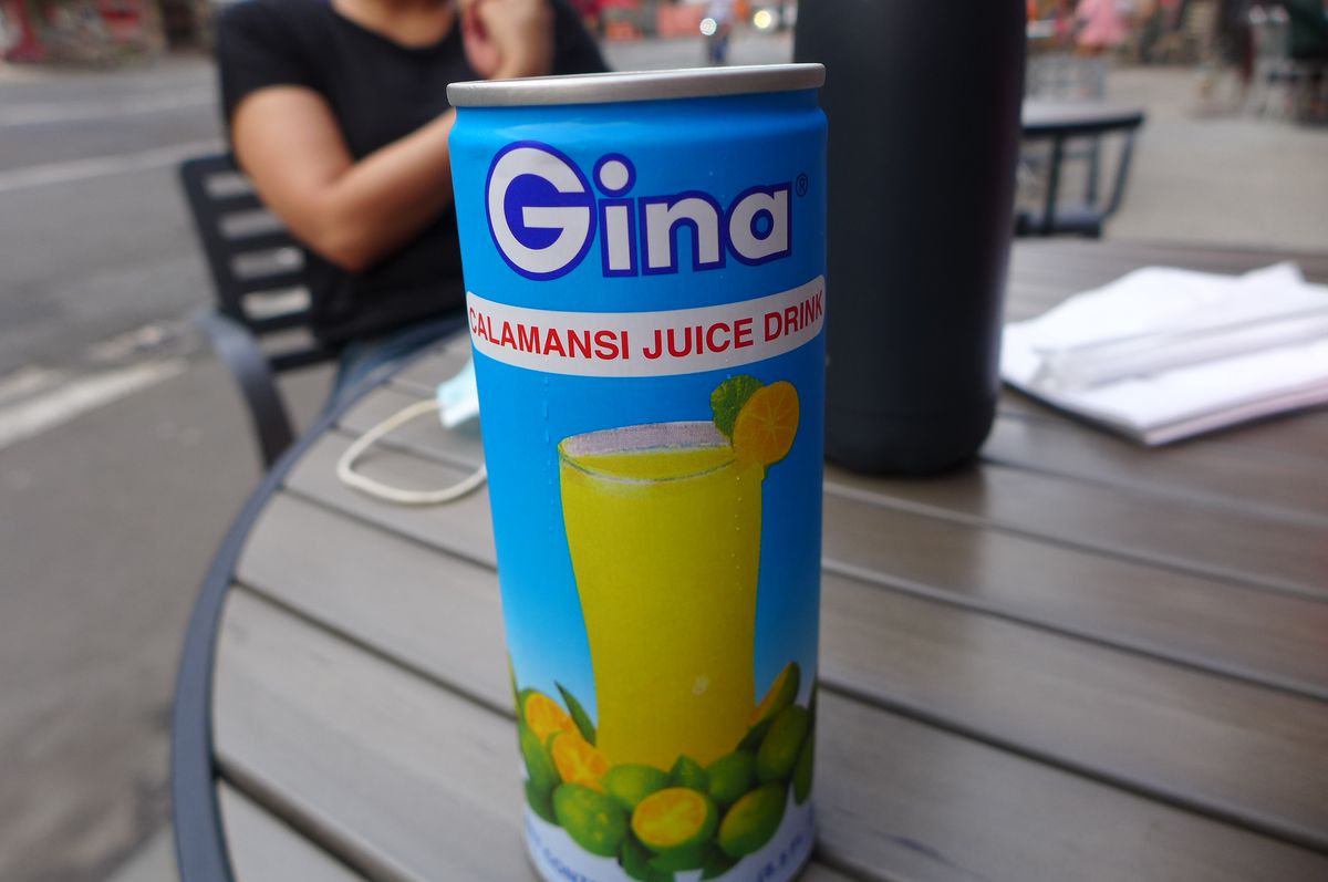 A tall blue can of lime nectar displayed on a table.