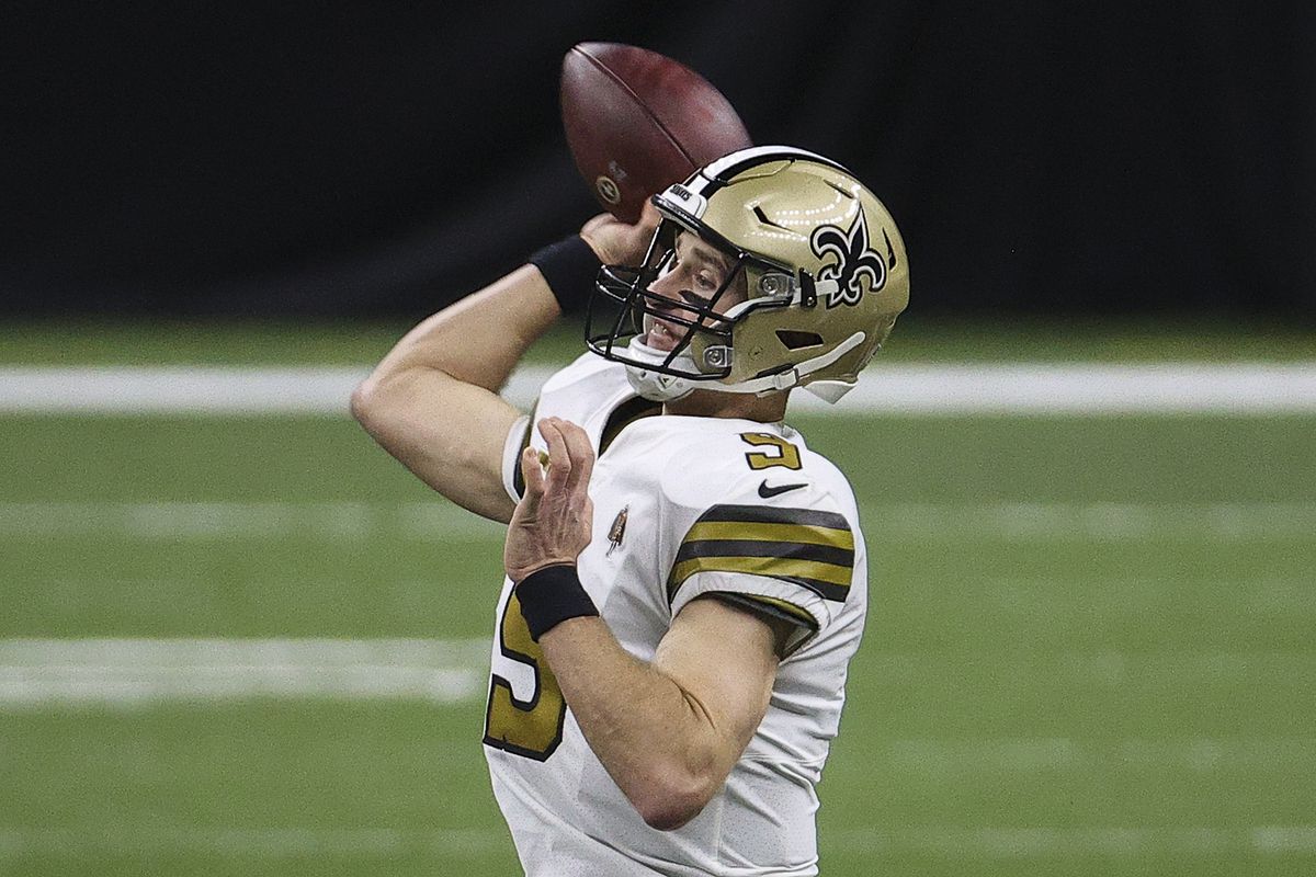 Drew Brees #9 of the New Orleans Saints attemps a pass during the first quarter against the Minnesota Vikings at Mercedes-Benz Superdome on December 25, 2020 in New Orleans, Louisiana.
