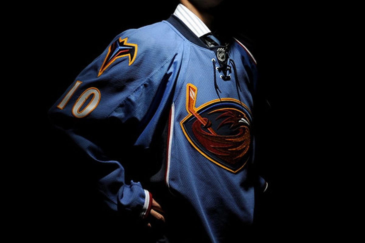 LOS ANGELES, CA - JUNE 25:  Alexander Burmistrov, drafted eighth overall by the Atlanta Thrashers, poses on stage during the 2010 NHL Entry Draft at Staples Center on June 25, 2010 in Los Angeles, California.  (Photo by Harry How/Getty Images)
