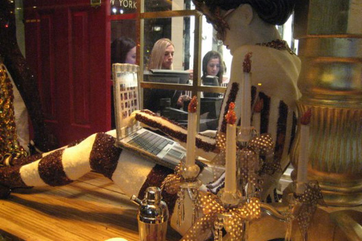A bedazzled blogger at work in Bendel's holiday windows