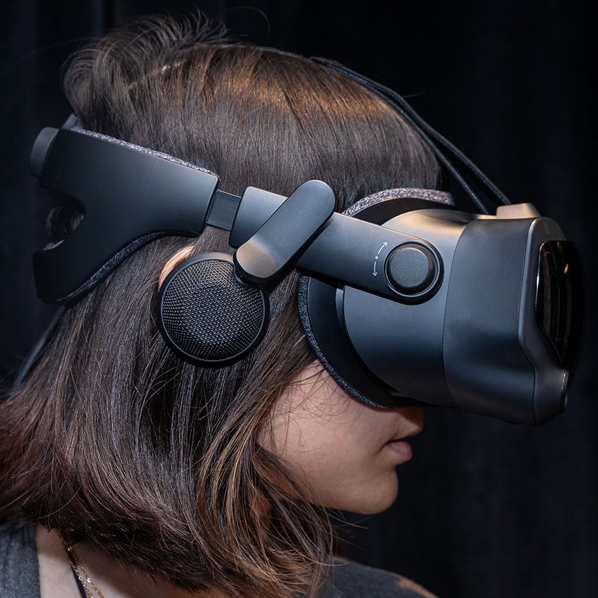 Woman wearing Valve Index VR headset