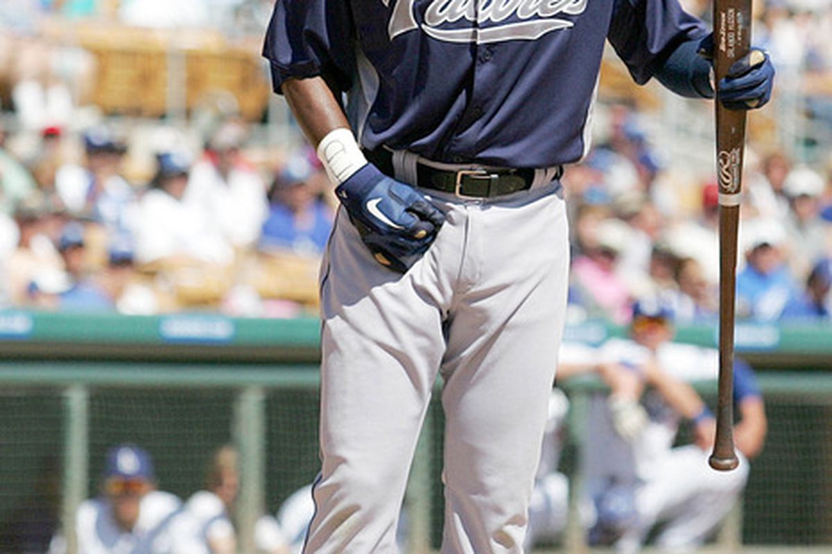 Mar 21, 2012; Glendale, AZ, USA; San Diego Padres second baseman Orlando Hudson (1) reacts after hitting a ball off his foot during the third inning against the Los Angeles Dodgers at Camelback Ranch.  Mandatory Credit: Jake Roth-US PRESSWIRE