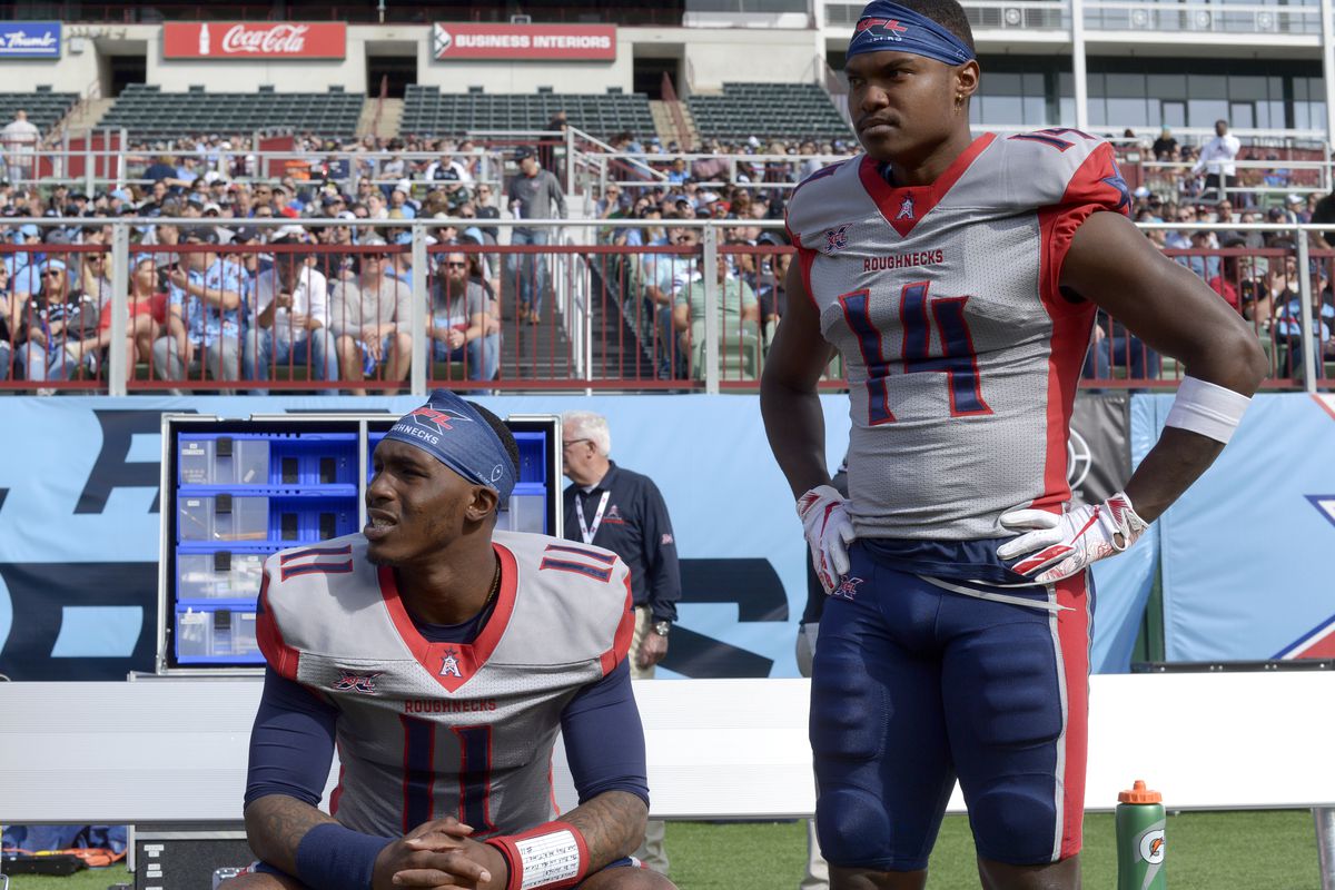 P.J. Walker and Cam Phillips of the Houston Roughnecks look on before the XFL game against the Dallas Renegades at Globe Life Park on March 1, 2020 in Arlington, Texas.