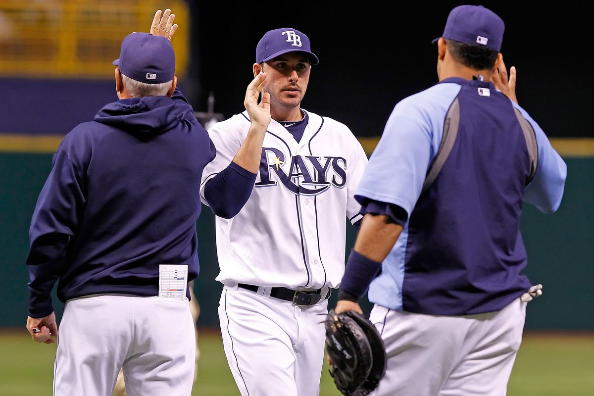 ST. PETERSBURG - JULY 17:  Outfielder Matt Joyce #20 of the Tampa Bay Rays celebrates victory over the Cleveland Indians during the game at Tropicana Field on July 17, 2012 in St. Petersburg, Florida.  (Photo by J. Meric/Getty Images)