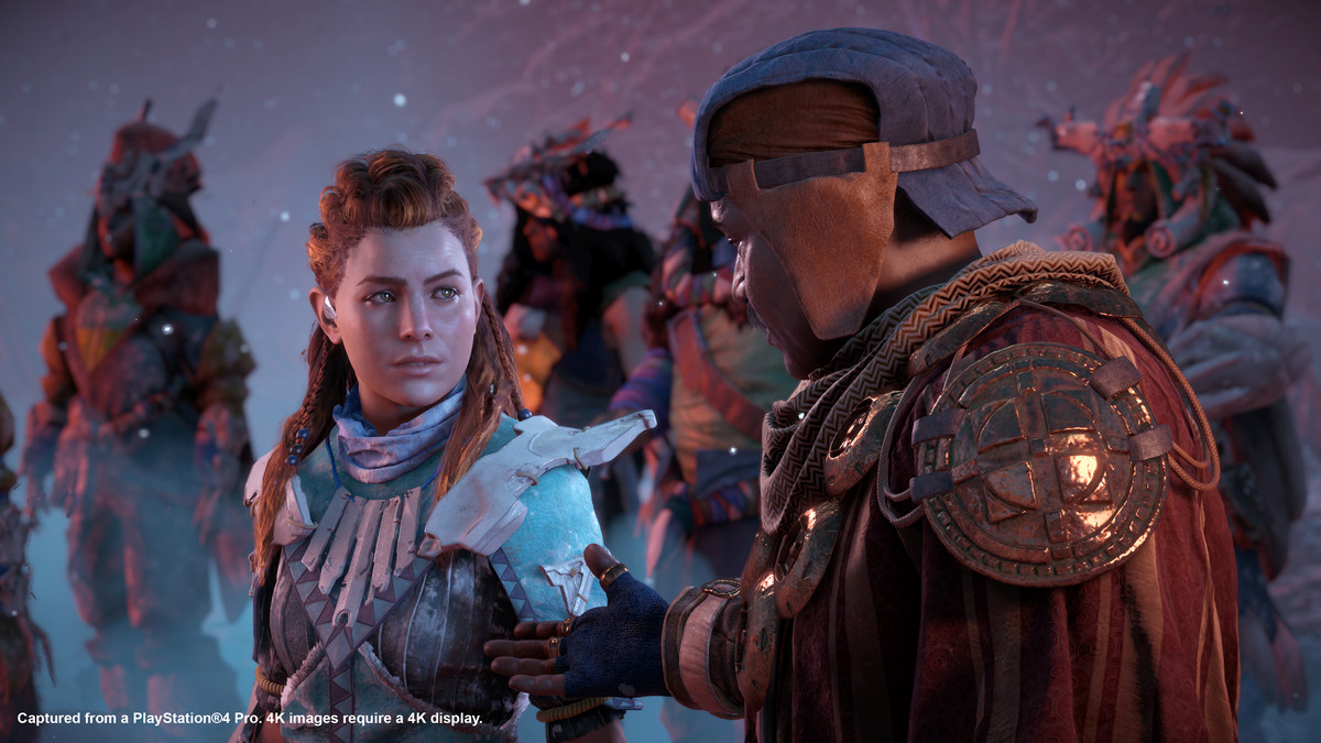 Horizon Zero Dawn: The Frozen Wilds - Aloy discusses strategy with an ally