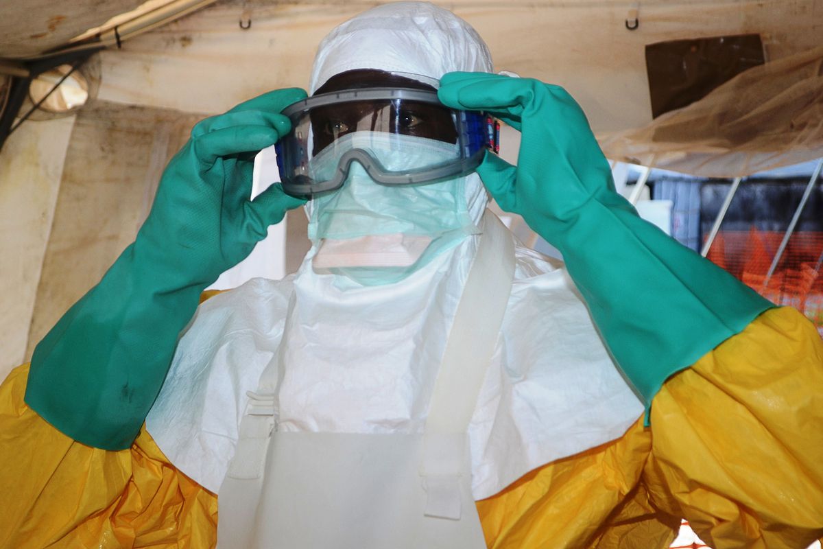 A member of Doctors Without Borders wearing protective gear in Conakry, Guinea