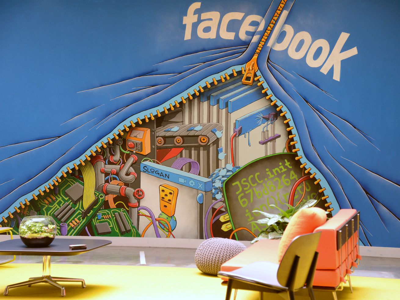 A mural in Facebook’s headquarters depicting a zipper revealing a scene underneath.