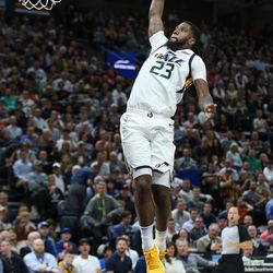 Utah Jazz forward Royce O'Neale (23) puts in a breakaway dunk during the game against the Golden State Warriors at Vivint Arena in Salt Lake City on Tuesday, April 10, 2018.