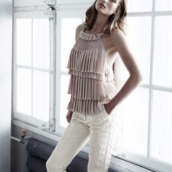 Top with pleated layers, $49.95; bonded trousers, $129