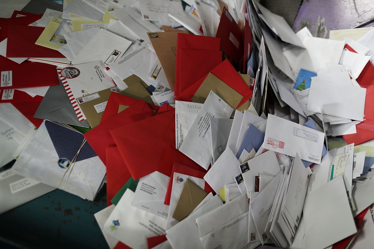 Postal Service Employees Work Through The Holiday Busy Period