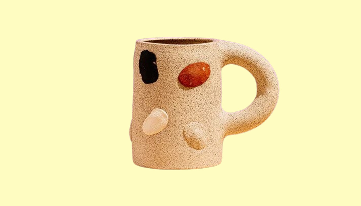A ceramic mug with rock motif