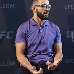 Dan Ige answers a question at UFC 225 media day.