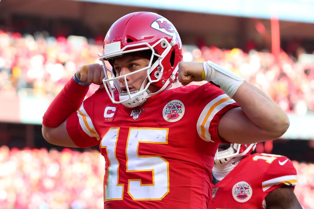 Patrick Mahomes #15 of the Kansas City Chiefs reacts after running for a 27 yard touchdown in the second quarter against the Tennessee Titans in the AFC Championship Game at Arrowhead Stadium on January 19, 2020 in Kansas City, Missouri.