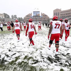 The Utes warm up prior to their game against the University of Colorado at Folsom Field in Boulder, Colorado, on Saturday, Nov. 17, 2018.