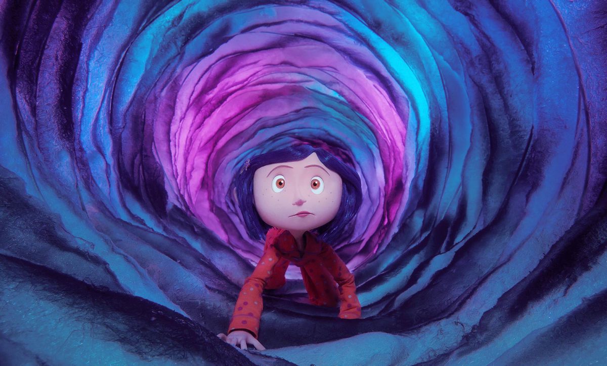 Coraline crawling through a translucent purple tunnel in Coraline (2009).