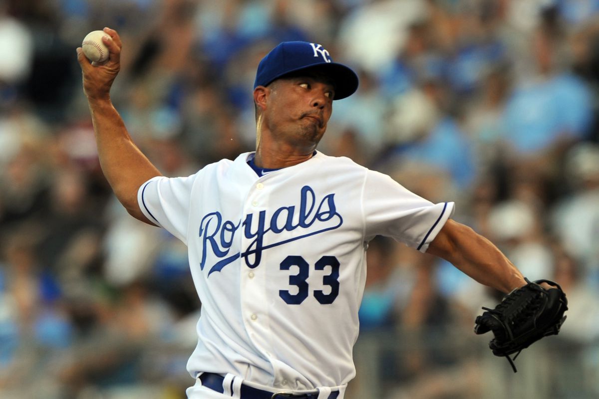 August 3, 2012; Kansas City, MO, USA; Kansas City Royals pitcher Jeremy Guthrie (33) delivers a pitch against the Texas Rangers during the first inning at Kauffman Stadium.  Mandatory Credit: Peter G. Aiken-US PRESSWIRE