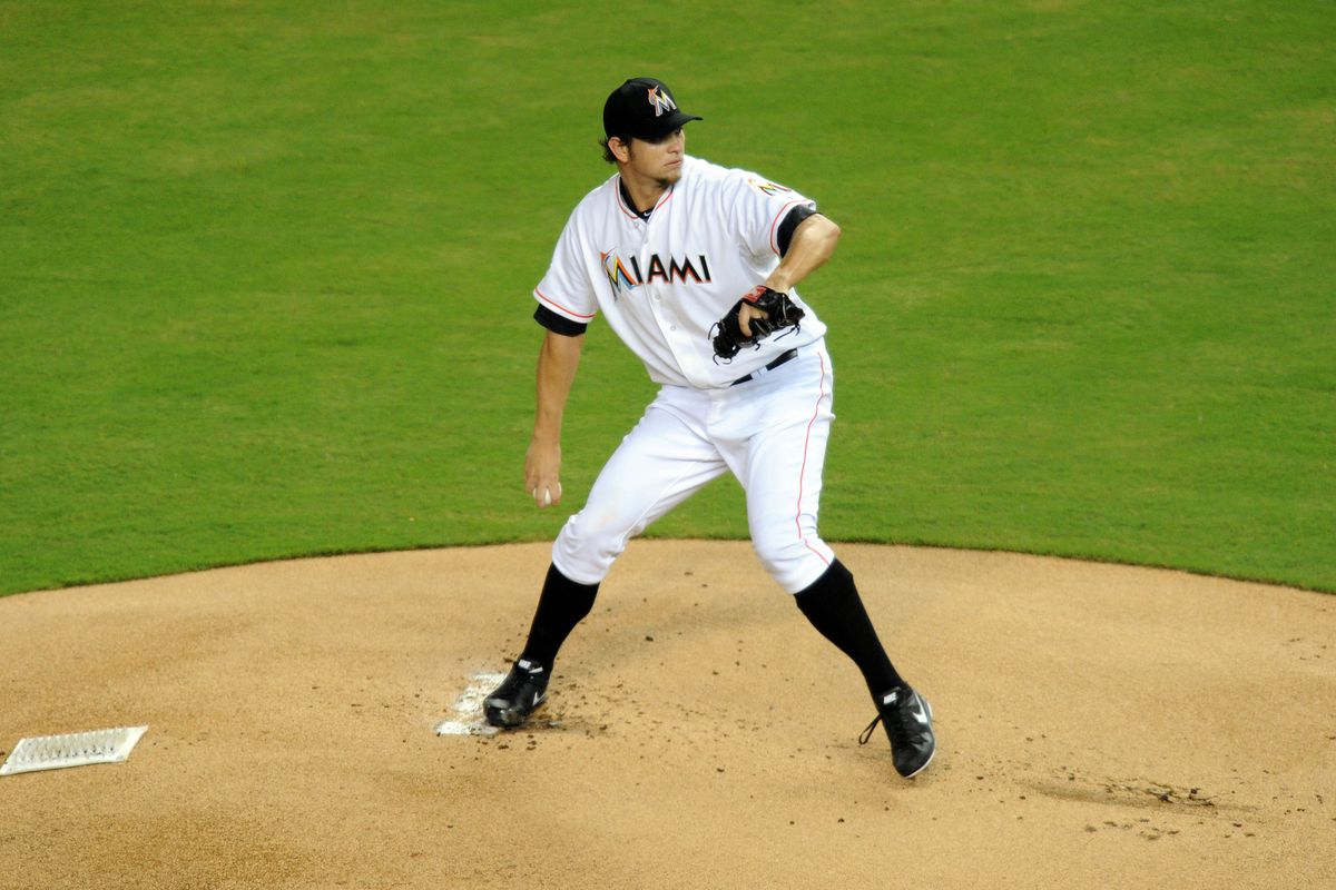Aug 14, 2012; Miami, FL, USA; Miami Marlins starting pitcher Josh Johnson (55) throws during the first inning against the Philadelphia Phillies at Marlins Park. Mandatory Credit: Steve Mitchell-US PRESSWIRE