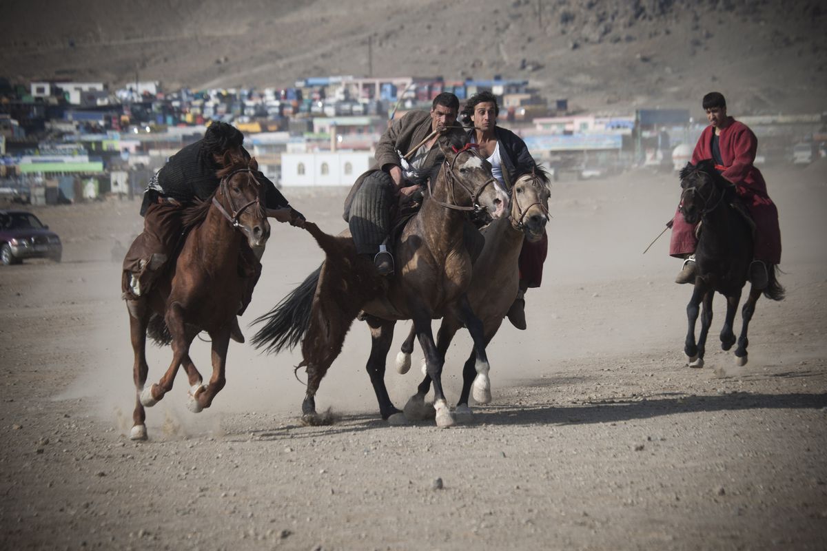 Afghans Play A Traditional Game Of Buzkashi
