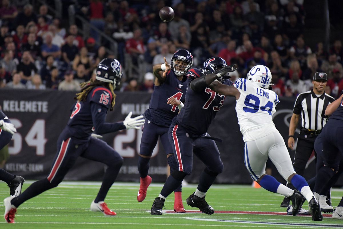 Houston Texans quarterback Deshaun Watson throws a pass to Houston Texans wide receiver Will Fuller in the second quarter against the Indianapolis Colts at NRG Stadium.