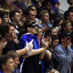 Pleasant Grove fans cheer as Davis plays Pleasant Grove in the 5A boys basketball quarterfinals at the Dee Events Center in Ogden Wednesday, Feb. 25, 2015.
