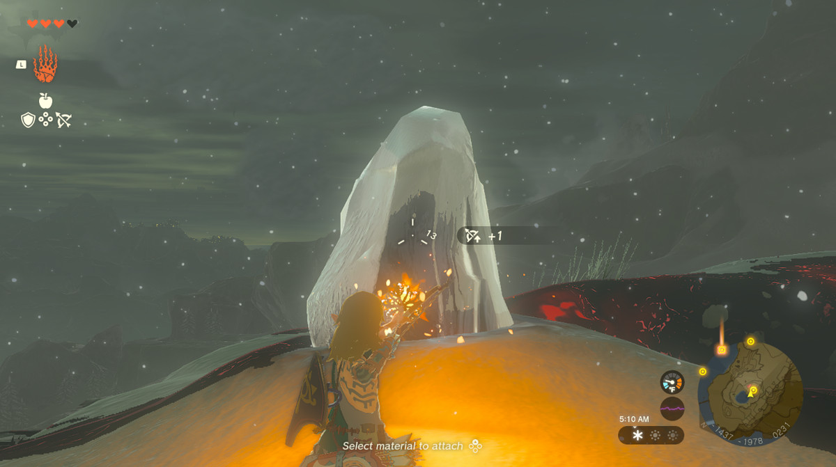 Link shoots a block of ice with a fire arrow to reveal a goddess eye in Tears of the Kingdom.