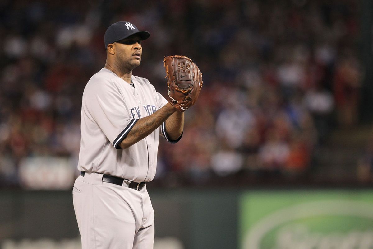 Apr 23, 2012; Arlington, TX, USA; New York Yankees starting pitcher CC Sabathia pitches in the seventh inning against the Texas Rangers at Rangers Ballpark.  Mandatory Credit: Matthew Emmons-US PRESSWIRE