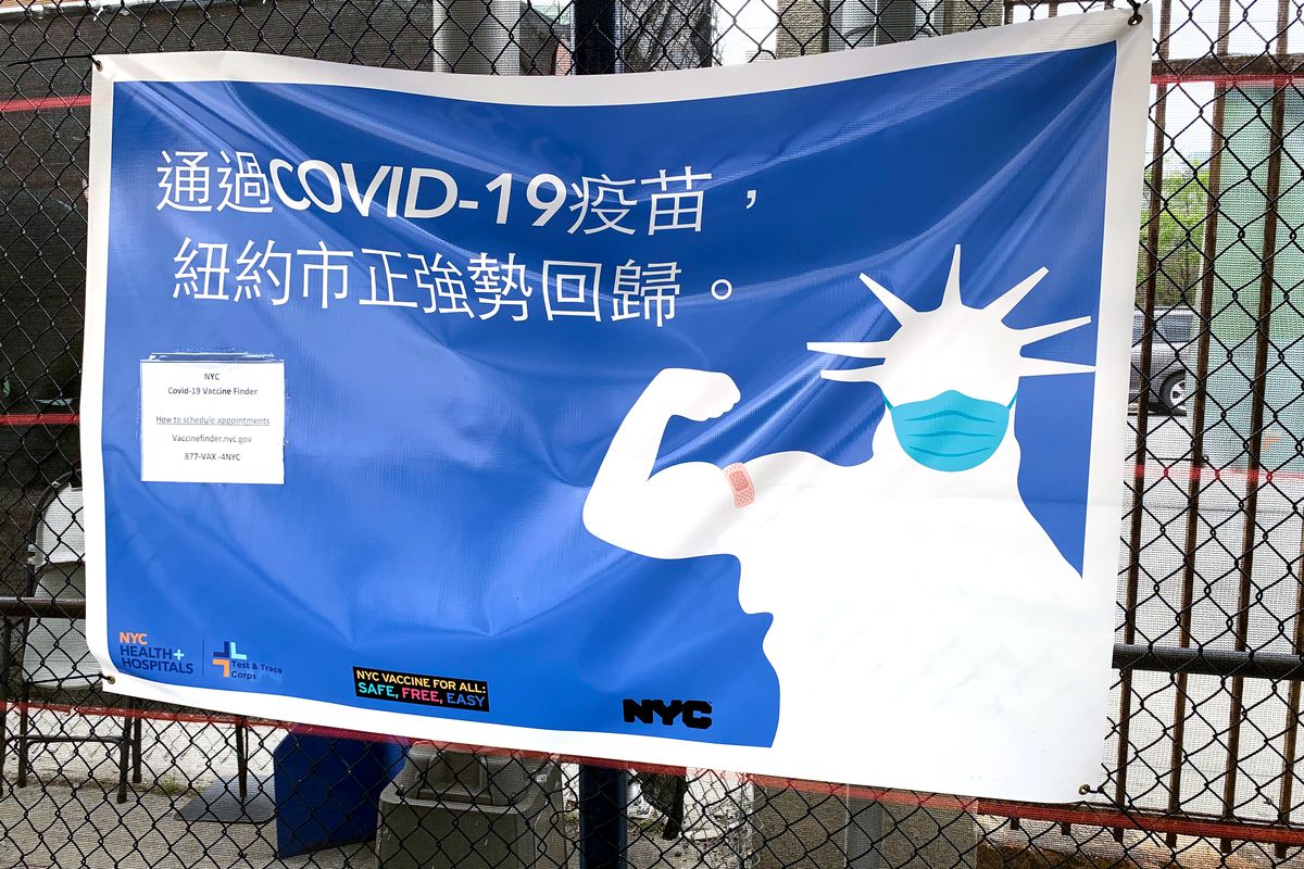 Information in different languages outside the Brooklyn Army Terminal vaccine site, April 29, 2021.