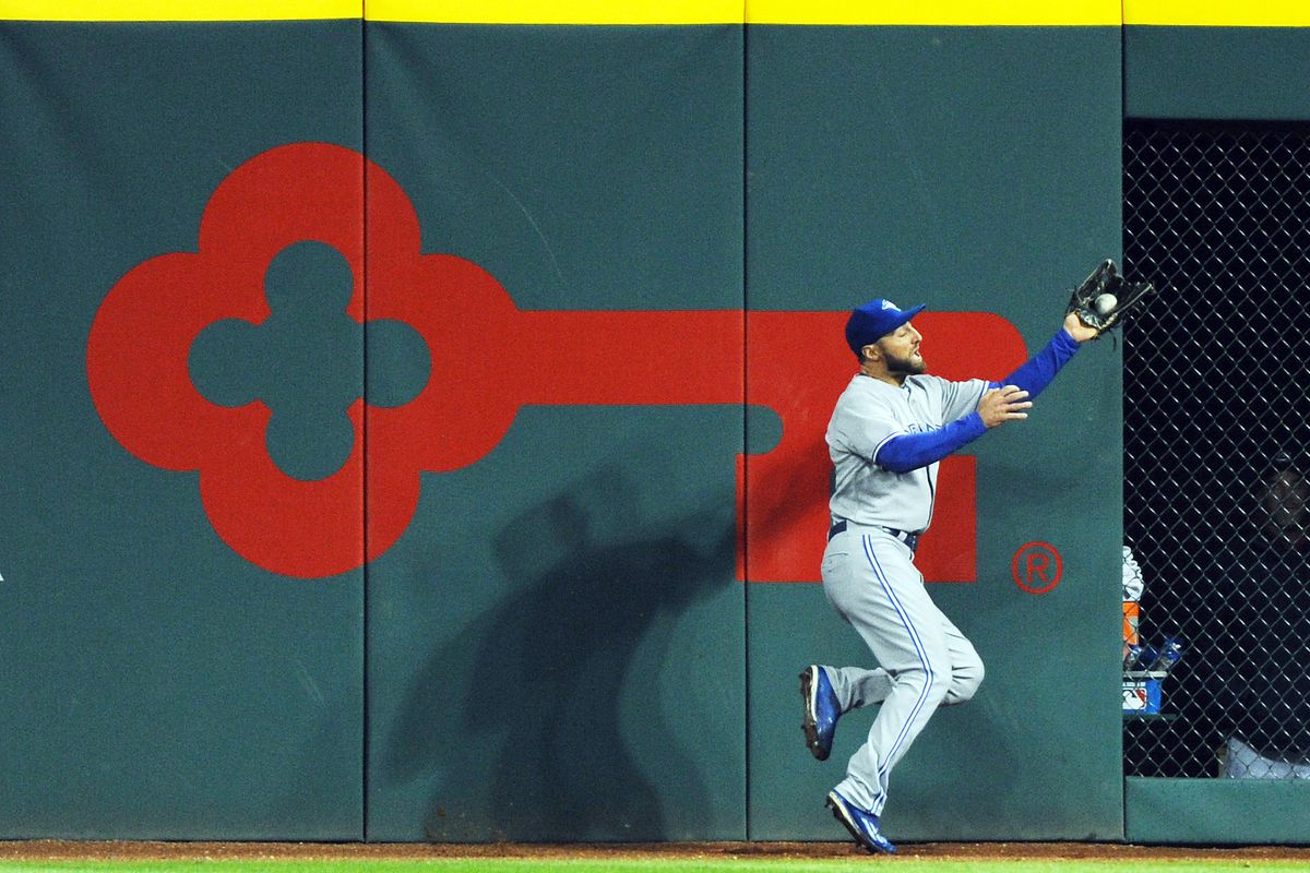 Kevin Pillar crashes into the wall making another one of his fantastic catches. 