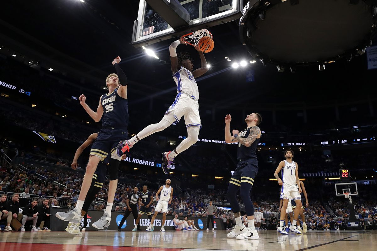 Mark Mitchell #25 of the Duke Blue Devils reacts as he dunks against Oral Roberts Golden Eagles during the first half in the first round of the NCAA Men’s Basketball Tournament at Amway Center on March 16, 2023 in Orlando, Florida.