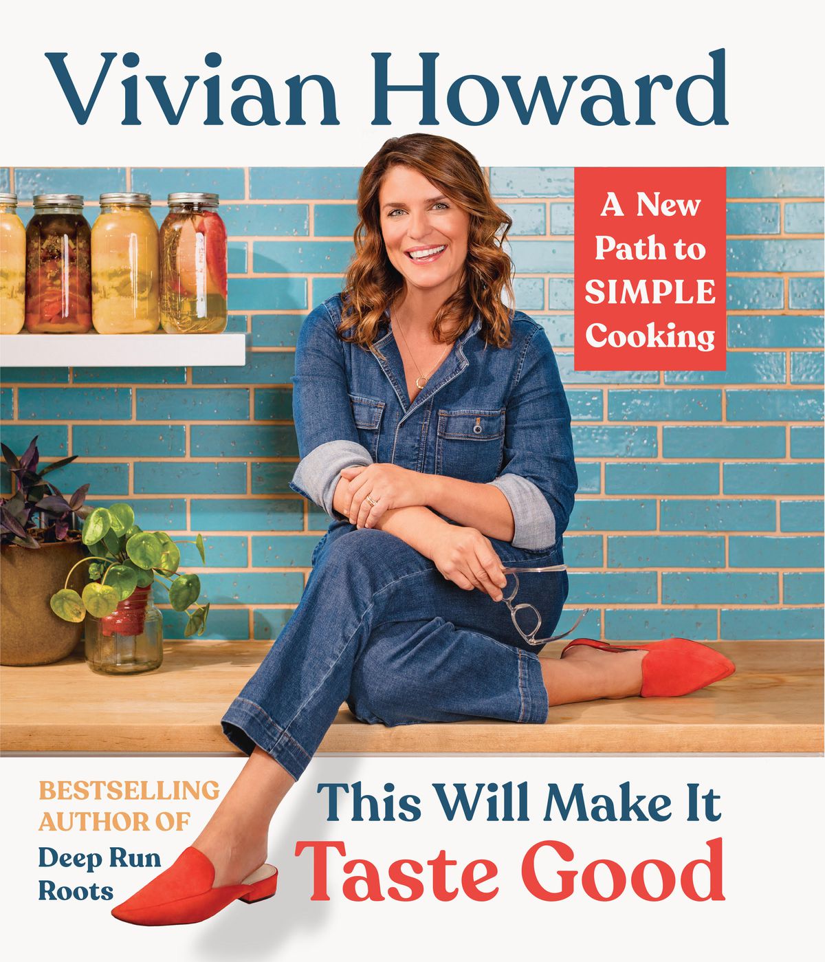 Vivian Howard sitting on a kitchen counter on the cover of This Will Make it Taste Good
