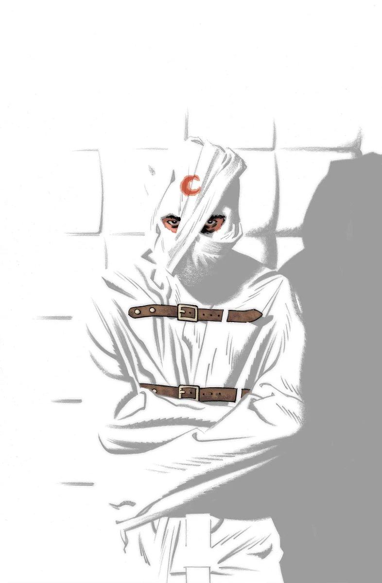 Moon Knight stares at the viewer from a padded cell. He has a fully buckled straight jacket on, and his head is roughly wrapped in fabric with his crescent moon symbol on his forehead in what is presumably blood. The walls, his clothing, and the wrap around his head are a cold white. The cover of Moon Knight #1 (2016).