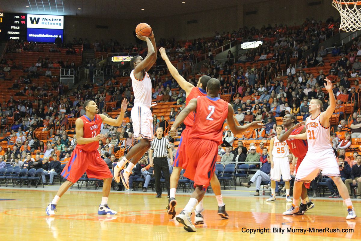 Julian Washburn shoots over an SMU defender.  The Miners were victorious over the Mustangs on January 19th by a final of 63 to 54 in a CUSA game.