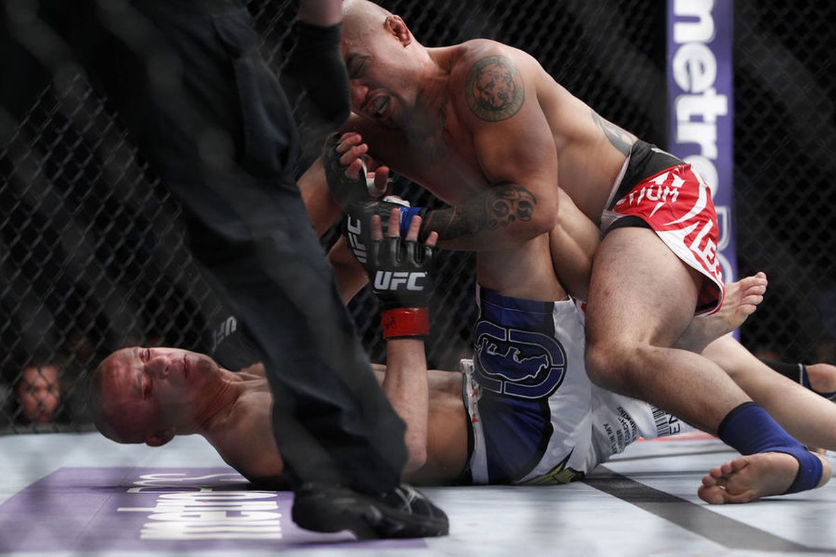 Eddie Yagin (top) grounds and pounds Mark Hominick (bottom) at UFC 145 last night. Photo by Esther Lin via <a href="http://cdn1.sbnation.com/entry_photo_images/3787591/042_Mark_Hominick_vs_Eddie_Yagin_gallery_post.jpg">MMA Fighting</a>