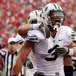 Brigham Young Cougars linebacker Kyle Van Noy (3) celebrates his defensive touchdown with teammates during  the Cougar season opener with Ole Miss in Oxford, Miss  Sunday, Sept. 4, 2011.