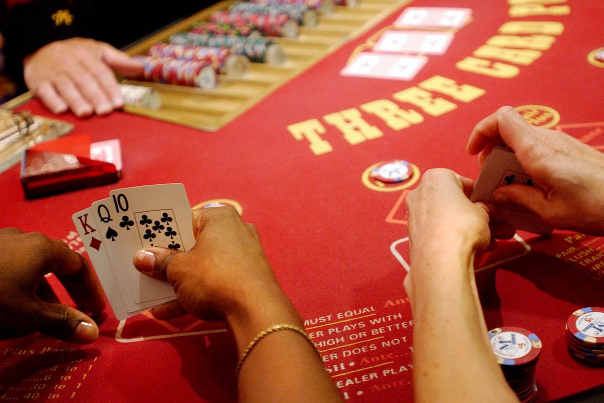 Players play three card poker at the Majestic Star Casino in Gary in 2004. Casino developers will make their final pitches next month for licenses in Waukegan and Chicago’s south suburbs