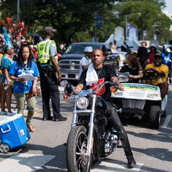 Rapper Vic Mensa prepares to kick off the Bud Billiken Day Parade as grand marshall on August 11, 2018. | Max Herman/For the Sun-Times