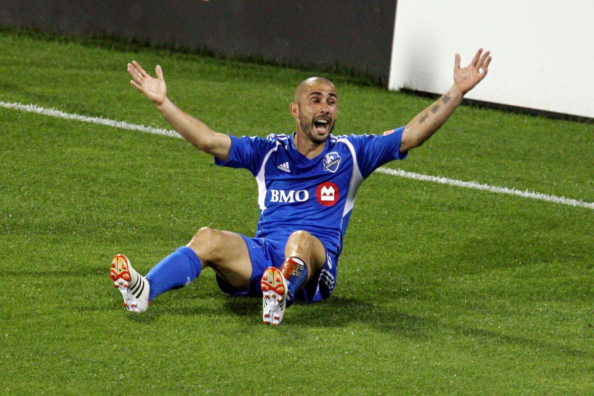 July 28, 2012; Montreal, QC, CAN; Montreal Impact forward Marco Di Vaio (9) reacts during the second half against New York Red Bulls at the Stade Saputo. The Impact defeated the Red Bulls 3-1. Mandatory Credit: Jean-Yves Ahern-US PRESSWIRE.