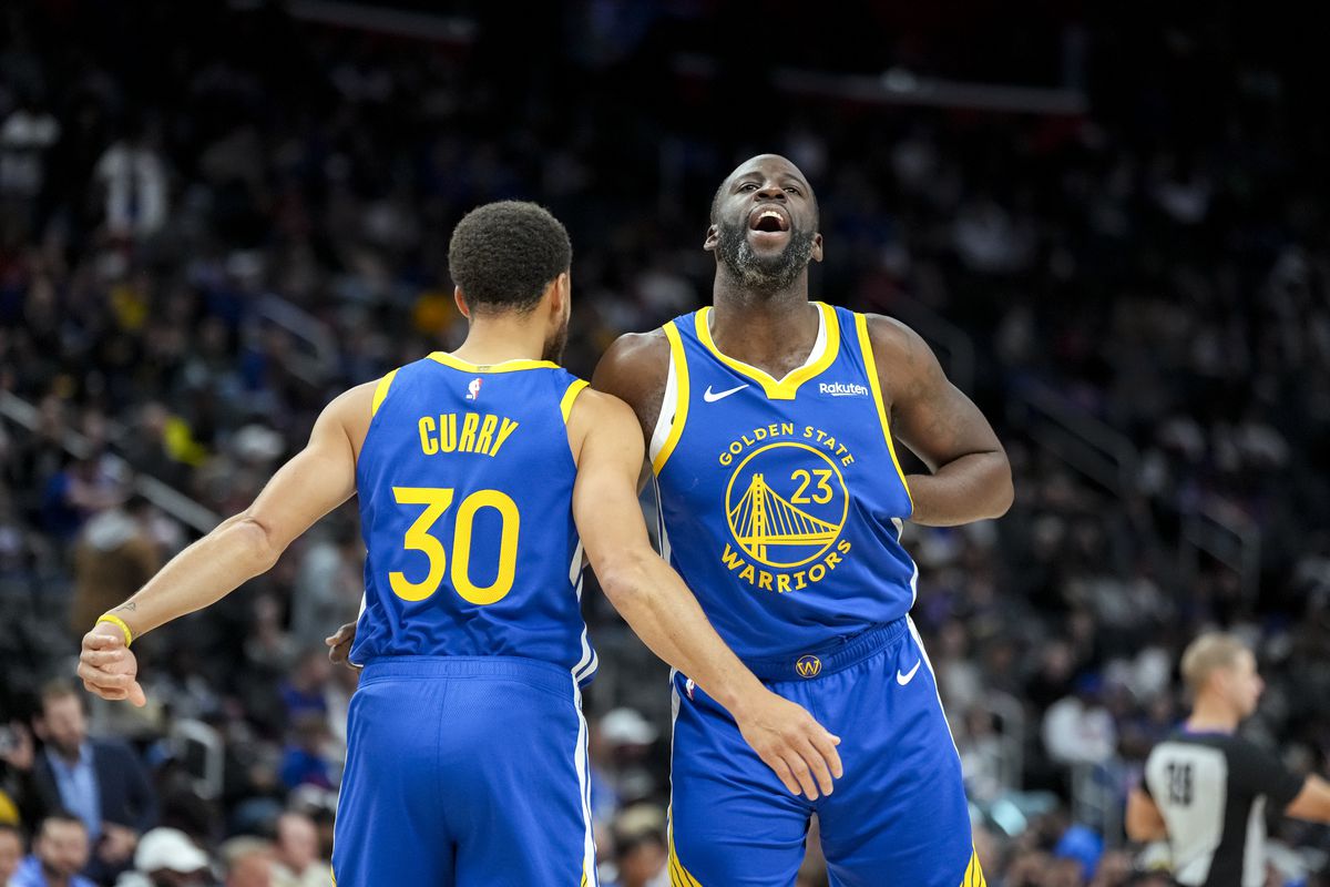 Steph Curry celebrating with Draymond Green