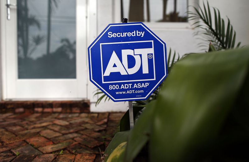 An ADT yard sign.
