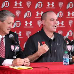 FILE - Athletic director Chris Hill, left,  Greg Marsden  and Megan Marsden at the formal press conference at the University of Utah announcing the retirement of gymnastics coach Greg Marsden, after 40 years coaching, and the two new co-head coaches Megan Marsden and Tom Farden Tuesday, April 21, 2015, in Salt Lake City.
