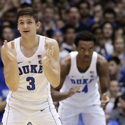 Duke's Grayson Allen, left, reacts during the first half of a game against Syracuse in Durham, N.C., Saturday, Feb. 24, 2018.