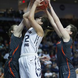 Brigham Young Cougars forward Kalani Purcell (32) tries to shoot by Pepperdine Waves forward Krista Pettepier (24) during the WCC tournament in Las Vegas Friday, March 4, 2016. BYU won 72-59. 