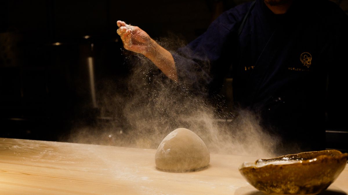 A ball of dough on a table.