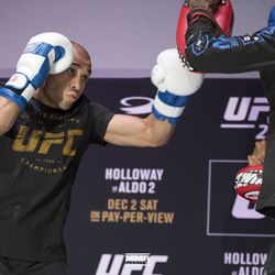 Jose Aldo throws a punch at UFC 218 workouts.