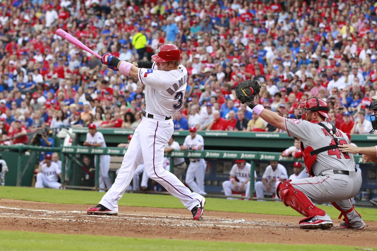 May 13, 2012; Arlington, TX, USA; Texas Rangers center fielder Josh Hamilton (32) strikes out during the first inning of the game against the Los Angeles Angels at Rangers Ballpark. Mandatory Credit: Tim Heitman-US PRESSWIRE