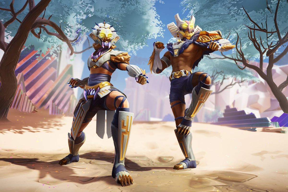 Dauntless - Two armored figures pose in seasonal armor from the Infinite Radiance patch.