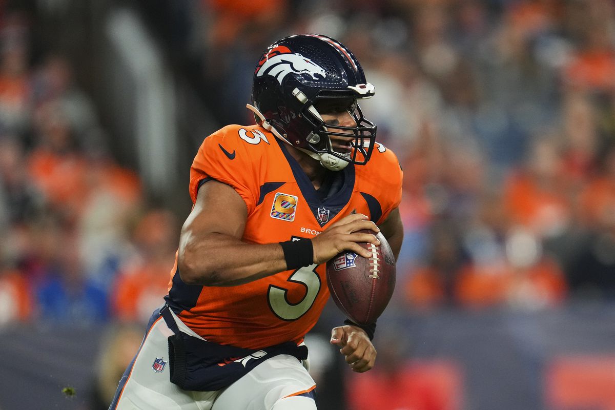 Russell Wilson #3 of the Denver Broncos scrambles against the Indianapolis Colts at Empower Field at Mile High on October 6, 2022 in Denver, Texas.