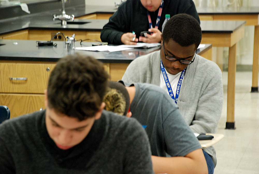 Students at Aurora Central High School work on an assignment during class during the spring of 2015.