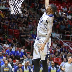 The Utah Jazz's Devondrick Walker dunks the ball during a Utah Jazz Summer League basketball game against the San Antonio Spurs at the Huntsman Center in Salt Lake City on Monday, July 3, 2017. Utah won 87-74.